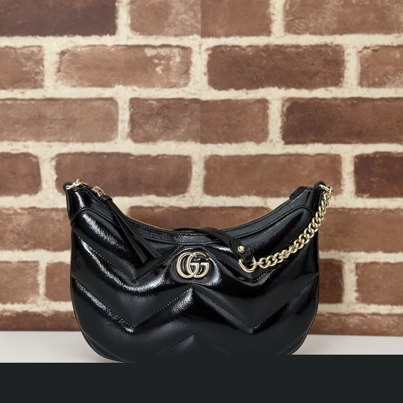 G*u*i top handle bags